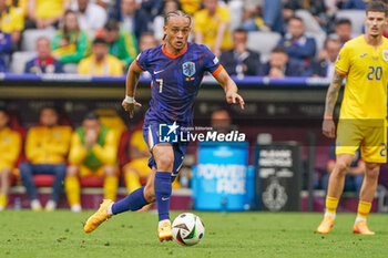 2024-07-02 - Xavi Simons of Netherlands during the UEFA Euro 2024, Round of 16 football match between Romania and Netherlands on July 2, 2024 at Allianz Arena in Munich, Germany - FOOTBALL - EURO 2024 - 1/8 - ROMANIA V NETHERLANDS - UEFA EUROPEAN - SOCCER