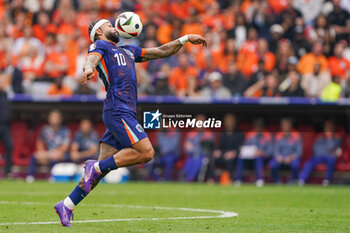 2024-07-02 - Memphis Depay of Netherlands during the UEFA Euro 2024, Round of 16 football match between Romania and Netherlands on July 2, 2024 at Allianz Arena in Munich, Germany - FOOTBALL - EURO 2024 - 1/8 - ROMANIA V NETHERLANDS - UEFA EUROPEAN - SOCCER