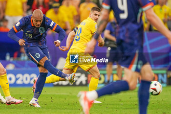 2024-07-02 - Donyell Malen of Netherlands shoots at goal for the 0-3 during the UEFA Euro 2024, Round of 16 football match between Romania and Netherlands on July 2, 2024 at Allianz Arena in Munich, Germany - FOOTBALL - EURO 2024 - 1/8 - ROMANIA V NETHERLANDS - UEFA EUROPEAN - SOCCER