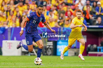 2024-07-02 - Cody Gakpo of Netherlands during the UEFA Euro 2024, Round of 16 football match between Romania and Netherlands on July 2, 2024 at Allianz Arena in Munich, Germany - FOOTBALL - EURO 2024 - 1/8 - ROMANIA V NETHERLANDS - UEFA EUROPEAN - SOCCER