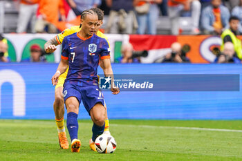 2024-07-02 - Xavi Simons of Netherlands during the UEFA Euro 2024, Round of 16 football match between Romania and Netherlands on July 2, 2024 at Allianz Arena in Munich, Germany - FOOTBALL - EURO 2024 - 1/8 - ROMANIA V NETHERLANDS - UEFA EUROPEAN - SOCCER