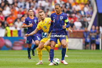 2024-07-02 - Denis Dragus of Romania, Virgil van Dijk of Netherlands during the UEFA Euro 2024, Round of 16 football match between Romania and Netherlands on July 2, 2024 at Allianz Arena in Munich, Germany - FOOTBALL - EURO 2024 - 1/8 - ROMANIA V NETHERLANDS - UEFA EUROPEAN - SOCCER