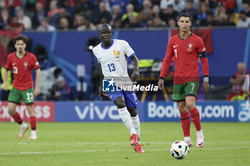 2024-07-05 - N'Golo Kante of France, Cristiano Ronaldo of Portugal during the UEFA Euro 2024, quarter-final football match between Portugal and France on July 5, 2024 at Volksparkstadion in Hamburg, Germany - FOOTBALL - EURO 2024 - 1/4 - PORTUGAL V FRANCE - UEFA EUROPEAN - SOCCER