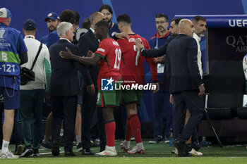 2024-07-05 - Cristiano Ronaldo of Portugal leaves the pitch following the penalty shootout of the UEFA Euro 2024, quarter-final football match between Portugal and France on July 5, 2024 at Volksparkstadion in Hamburg, Germany - FOOTBALL - EURO 2024 - 1/4 - PORTUGAL V FRANCE - UEFA EUROPEAN - SOCCER