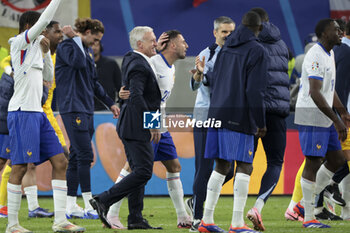 2024-07-05 - Coach of France Didier Deschamps celebrates the victory with Jonathan Clauss of France and his players following the penalty shootout of the UEFA Euro 2024, quarter-final football match between Portugal and France on July 5, 2024 at Volksparkstadion in Hamburg, Germany - FOOTBALL - EURO 2024 - 1/4 - PORTUGAL V FRANCE - UEFA EUROPEAN - SOCCER