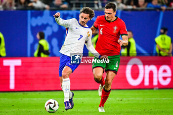 2024-07-05 - Antoine GRIEZMANN of France and Joao PALHINHA of Portugal during the UEFA Euro 2024, Quarter-finals football match between Portugal and France on July 5, 2024 at Volksparkstadion in Hamburg, Germany - FOOTBALL - EURO 2024 - 1/4 - PORTUGAL V FRANCE - UEFA EUROPEAN - SOCCER