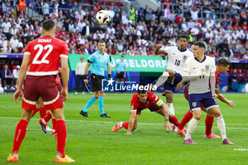 2024-07-07 - Jude Bellingham of England shoots during the UEFA Euro 2024, Quarter-finals football match between England and Switzerland on July 6, 2024 at Merkur Spiel-Arena in Düsseldorf, Germany - FOOTBALL - EURO 2024 - 1/4 - ENGLAND V SWITZERLAND - UEFA EUROPEAN - SOCCER