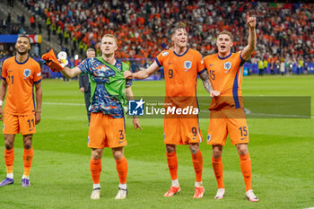 2024-07-06 - Matthijs De Ligt, Wout Weghorst, Micky van de Ven of Netherlands are celebrating the win during the UEFA Euro 2024, Quarter-finals football match between Netherlands and Turkiye on July 6, 2024 at Olympiastadion in Berlin, Germany - FOOTBALL - EURO 2024 - 1/4 - NETHERLANDS V TURKIYE - UEFA EUROPEAN - SOCCER