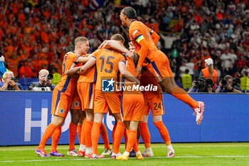 2024-07-06 - Netherlands players celebrate the Turkiye Mert Muldur's own goal 2-1 during the UEFA Euro 2024, Quarter-finals football match between Netherlands and Turkiye on July 6, 2024 at Olympiastadion in Berlin, Germany - FOOTBALL - EURO 2024 - 1/4 - NETHERLANDS V TURKIYE - UEFA EUROPEAN - SOCCER