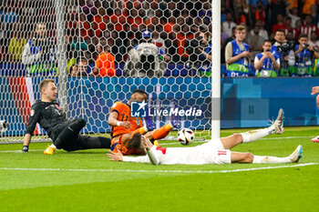 2024-07-06 - Mert Muldur of Turkiye scores an own goal 2-1, Goalkeeper Mert Gunok of Turkiye, Cody Gakpo of Netherlands during the UEFA Euro 2024, Quarter-finals football match between Netherlands and Turkiye on July 6, 2024 at Olympiastadion in Berlin, Germany - FOOTBALL - EURO 2024 - 1/4 - NETHERLANDS V TURKIYE - UEFA EUROPEAN - SOCCER