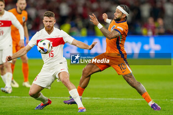 2024-07-06 - Salih Ozcan of Turkiye, Memphis Depay of Netherlands during the UEFA Euro 2024, Quarter-finals football match between Netherlands and Turkiye on July 6, 2024 at Olympiastadion in Berlin, Germany - FOOTBALL - EURO 2024 - 1/4 - NETHERLANDS V TURKIYE - UEFA EUROPEAN - SOCCER