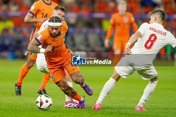 2024-07-06 - Memphis Depay of Netherlands, Arda Guler of Turkiye during the UEFA Euro 2024, Quarter-finals football match between Netherlands and Turkiye on July 6, 2024 at Olympiastadion in Berlin, Germany - FOOTBALL - EURO 2024 - 1/4 - NETHERLANDS V TURKIYE - UEFA EUROPEAN - SOCCER