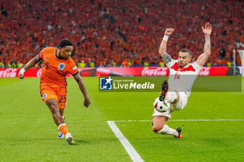 2024-07-06 - Steven Bergwijn of Netherlands, Abdulkerim Bardakci of Turkiye during the UEFA Euro 2024, Quarter-finals football match between Netherlands and Turkiye on July 6, 2024 at Olympiastadion in Berlin, Germany - FOOTBALL - EURO 2024 - 1/4 - NETHERLANDS V TURKIYE - UEFA EUROPEAN - SOCCER