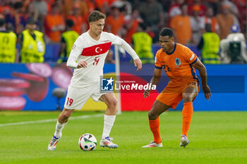 2024-07-06 - Kenan Yildiz of Turkiye, Denzel Dumfries of Netherlands during the UEFA Euro 2024, Quarter-finals football match between Netherlands and Turkiye on July 6, 2024 at Olympiastadion in Berlin, Germany - FOOTBALL - EURO 2024 - 1/4 - NETHERLANDS V TURKIYE - UEFA EUROPEAN - SOCCER