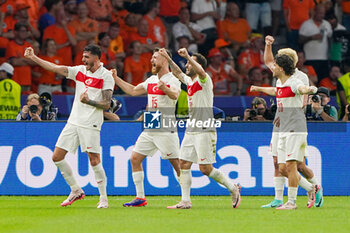 2024-07-06 - Samet Akaydin of Turkiye celebrates his goal 0-1 with teammates during the UEFA Euro 2024, Quarter-finals football match between Netherlands and Turkiye on July 6, 2024 at Olympiastadion in Berlin, Germany - FOOTBALL - EURO 2024 - 1/4 - NETHERLANDS V TURKIYE - UEFA EUROPEAN - SOCCER