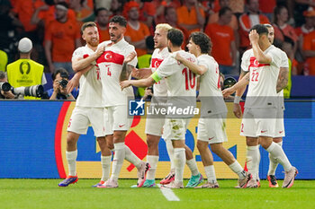 2024-07-06 - Samet Akaydin of Turkiye celebrates his goal 0-1 with teammates during the UEFA Euro 2024, Quarter-finals football match between Netherlands and Turkiye on July 6, 2024 at Olympiastadion in Berlin, Germany - FOOTBALL - EURO 2024 - 1/4 - NETHERLANDS V TURKIYE - UEFA EUROPEAN - SOCCER