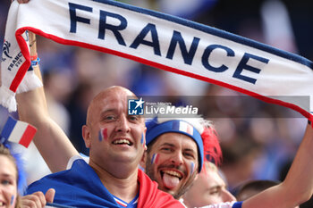 2024-07-09 - Munich , Germany 09.07.2024: Colors of French fans on the stand before the UEFA EURO 2024 semi-finals, football match between Spain vs France at Munich Football Arena - UEFA EURO 2024 - SEMIFINALS - SPAIN VS FRANCE  - UEFA EUROPEAN - SOCCER