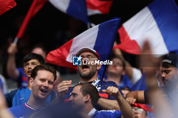 2024-07-09 - Munich , Germany 09.07.2024: Colors of French fans on the stand before the UEFA EURO 2024 semi-finals, football match between Spain vs France at Munich Football Arena - UEFA EURO 2024 - SEMIFINALS - SPAIN VS FRANCE  - UEFA EUROPEAN - SOCCER