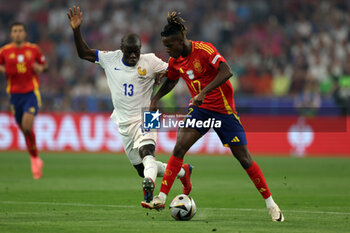 2024-07-09 - Munich , Germany 09.07.2024: Nico Williams of Spain, N'Golo Kante of France during the UEFA EURO 2024 semi-finals, football match between Spain vs France at Munich Football Allianz Arena - UEFA EURO 2024 - SEMIFINALS - SPAIN VS FRANCE  - UEFA EUROPEAN - SOCCER