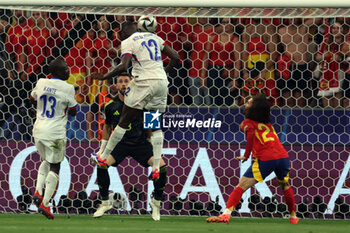 2024-07-09 - Munich , Germany 09.07.2024: Randal Kolo Muani of France scores the goal 1-0 and celebrates with his teammates during the UEFA EURO 2024 semi-finals, football match between Spain vs France at Munich Football Allianz Arena - UEFA EURO 2024 - SEMIFINALS - SPAIN VS FRANCE  - UEFA EUROPEAN - SOCCER