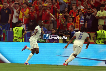 2024-07-09 - Munich , Germany 09.07.2024: Randal Kolo Muani of France scores the goal 1-0 and celebrates with his teammates during the UEFA EURO 2024 semi-finals, football match between Spain vs France at Munich Football Allianz Arena - UEFA EURO 2024 - SEMIFINALS - SPAIN VS FRANCE  - UEFA EUROPEAN - SOCCER