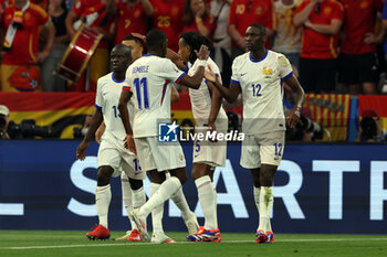 2024-07-09 - Munich , Germany 09.07.2024: Randal Kolo Muani of France scores the goal 1-0 and celebrates with his teammates during the UEFA EURO 2024 semi-finals, football match between Spain vs France at Munich Football Allianz Arena - UEFA EURO 2024 - SEMIFINALS - SPAIN VS FRANCE  - UEFA EUROPEAN - SOCCER