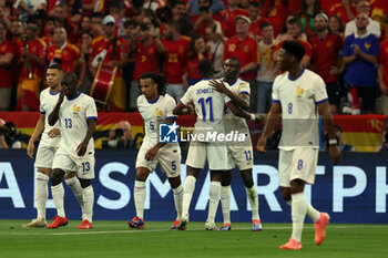 2024-07-09 - Munich , Germany 09.07.2024: Randal Kolo Muani of France scores the goal 1-0 and celebrates with his teammates during the UEFA EURO 2024 semi-finals, football match between Spain vs France at Munich Football Allianz Arena - UEFA EURO 2024 - SEMIFINALS - SPAIN VS FRANCE  - UEFA EUROPEAN - SOCCER