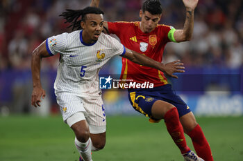 2024-07-09 - Munich , Germany 09.07.2024: Jules Kounde of France, Alvaro Morata of Spain during the UEFA EURO 2024 semi-finals, football match between Spain vs France at Munich Football Allianz Arena - UEFA EURO 2024 - SEMIFINALS - SPAIN VS FRANCE  - UEFA EUROPEAN - SOCCER