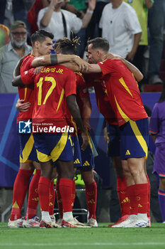 2024-07-09 - Munich , Germany 09.07.2024: dDani Olmo of Spain scores the goal 2-1 and celebrates with his teammates during the UEFA EURO 2024 semi-finals, football match between Spain vs France at Munich Football Allianz Arena - UEFA EURO 2024 - SEMIFINALS - SPAIN VS FRANCE  - UEFA EUROPEAN - SOCCER