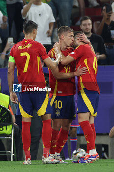 2024-07-09 - Munich , Germany 09.07.2024: dDani Olmo of Spain scores the goal 2-1 and celebrates with his teammates during the UEFA EURO 2024 semi-finals, football match between Spain vs France at Munich Football Allianz Arena - UEFA EURO 2024 - SEMIFINALS - SPAIN VS FRANCE  - UEFA EUROPEAN - SOCCER