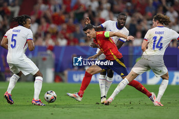 2024-07-09 - Munich , Germany 09.07.2024: Jules Kounde of France, Alvaro Morata of Spain during the UEFA EURO 2024 semi-finals, football match between Spain vs France at Munich Football Allianz Arena - UEFA EURO 2024 - SEMIFINALS - SPAIN VS FRANCE  - UEFA EUROPEAN - SOCCER