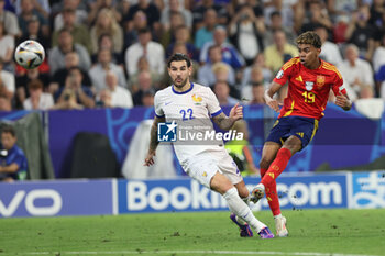 2024-07-09 - Munich , Germany 09.07.2024:Lamine Yamal of Spain, Theo Hernandez of France during the UEFA EURO 2024 semi-finals, football match between Spain vs France at Munich Football Allianz Arena - UEFA EURO 2024 - SEMIFINALS - SPAIN VS FRANCE  - UEFA EUROPEAN - SOCCER