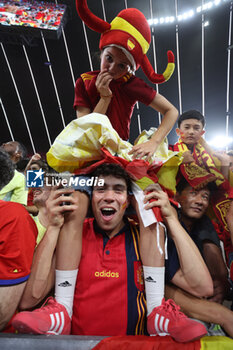 2024-07-09 - Munich , Germany 09.07.2024: Spanish fans celebrate the victory at the end during the UEFA EURO 2024 semi-finals, football match between Spain vs France at Munich Football Allianz Arena - UEFA EURO 2024 - SEMIFINALS - SPAIN VS FRANCE  - UEFA EUROPEAN - SOCCER