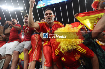 2024-07-09 - Munich , Germany 09.07.2024: Spanish fans celebrate the victory at the end during the UEFA EURO 2024 semi-finals, football match between Spain vs France at Munich Football Allianz Arena - UEFA EURO 2024 - SEMIFINALS - SPAIN VS FRANCE  - UEFA EUROPEAN - SOCCER