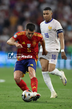 2024-07-09 - Munich , Germany 09.07.2024: Mikel Merino of Spain Kylian Mbappe of France during the UEFA EURO 2024 semi-finals, football match between Spain vs France at Munich Football Allianz Arena - UEFA EURO 2024 - SEMIFINALS - SPAIN VS FRANCE  - UEFA EUROPEAN - SOCCER