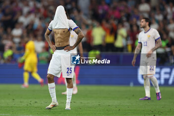 2024-07-09 - Munich , Germany 09.07.2024: French players Bradley Barcola of France disappointed after defeat in the UEFA EURO 2024 semi-finals, football match between Spain vs France at Munich Football Allianz Arena - UEFA EURO 2024 - SEMIFINALS - SPAIN VS FRANCE  - UEFA EUROPEAN - SOCCER