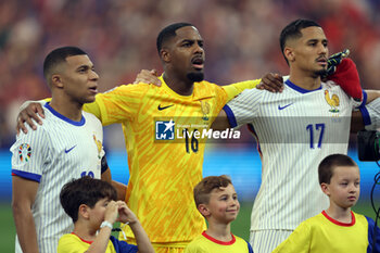 2024-07-09 - Munich , Germany 09.07.2024: Kylian Mbappe of France, Mike Maignan of France, William Saliba of France during the UEFA EURO 2024 semi-finals, football match between Spain vs France at Munich Football Allianz Arena - UEFA EURO 2024 - SEMIFINALS - SPAIN VS FRANCE  - UEFA EUROPEAN - SOCCER