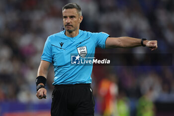 2024-07-09 - Munich , Germany 09.07.2024: referee Slavko Vincic during the UEFA EURO 2024 semi-finals, football match between Spain vs France at Munich Football Allianz Arena - UEFA EURO 2024 - SEMIFINALS - SPAIN VS FRANCE  - UEFA EUROPEAN - SOCCER