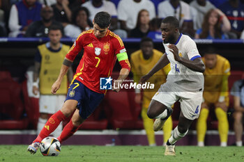 2024-07-09 - Munich , Germany 09.07.2024: Alvaro Morata of Spain, Ferland Mendy of France during the UEFA EURO 2024 semi-finals, football match between Spain vs France at Munich Football Allianz Arena - UEFA EURO 2024 - SEMIFINALS - SPAIN VS FRANCE  - UEFA EUROPEAN - SOCCER