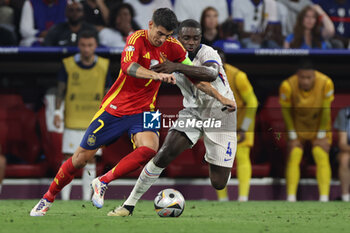 2024-07-09 - Munich , Germany 09.07.2024: Alvaro Morata of Spain, Ferland Mendy of France during the UEFA EURO 2024 semi-finals, football match between Spain vs France at Munich Football Allianz Arena - UEFA EURO 2024 - SEMIFINALS - SPAIN VS FRANCE  - UEFA EUROPEAN - SOCCER