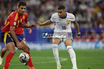 2024-07-09 - Munich , Germany 09.07.2024: Rodri of Spain, Kylian Mbappe of France during the UEFA EURO 2024 semi-finals, football match between Spain vs France at Munich Football Allianz Arena - UEFA EURO 2024 - SEMIFINALS - SPAIN VS FRANCE  - UEFA EUROPEAN - SOCCER