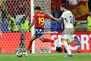 2024-07-09 - Munich , Germany 09.07.2024: Lamine Yamal of Spain, Theo Hernandez of France during the UEFA EURO 2024 semi-finals, football match between Spain vs France at Munich Football Allianz Arena - UEFA EURO 2024 - SEMIFINALS - SPAIN VS FRANCE  - UEFA EUROPEAN - SOCCER