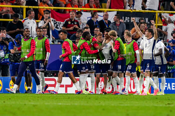 2024-07-10 - Ollie Watkins of England celebrates his goal 1-2 with teammates during the UEFA Euro 2024, Semi-finals football match between Netherlands and England on 10 July 2024 at Signal Iduna Park in Dortmund, Germany - FOOTBALL - EURO 2024 - 1/2 - NETHERLANDS V ENGLAND - UEFA EUROPEAN - SOCCER