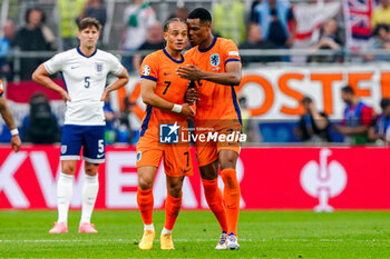 2024-07-10 - Xavi Simons of the Netherlands celebrates his goal 1-0 with Denzel Dumfries during the UEFA Euro 2024, Semi-finals football match between Netherlands and England on 10 July 2024 at Signal Iduna Park in Dortmund, Germany - FOOTBALL - EURO 2024 - 1/2 - NETHERLANDS V ENGLAND - UEFA EUROPEAN - SOCCER