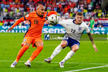 2024-07-10 - Donyell Malen of the Netherlands battles for possession with Kieran Trippier of England during the UEFA Euro 2024, Semi-finals football match between Netherlands and England on 10 July 2024 at Signal Iduna Park in Dortmund, Germany - FOOTBALL - EURO 2024 - 1/2 - NETHERLANDS V ENGLAND - UEFA EUROPEAN - SOCCER