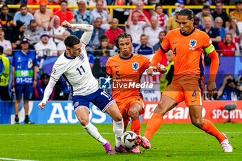 2024-07-10 - Phil Foden of England battles for possession with Nathan Ake, Virgil van Dijk of the Netherlands during the UEFA Euro 2024, Semi-finals football match between Netherlands and England on 10 July 2024 at Signal Iduna Park in Dortmund, Germany - FOOTBALL - EURO 2024 - 1/2 - NETHERLANDS V ENGLAND - UEFA EUROPEAN - SOCCER