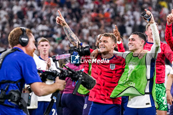 2024-07-10 - Kieran Trippier, Phil Foden of England celebrate after the UEFA Euro 2024, Semi-finals football match between Netherlands and England on 10 July 2024 at Signal Iduna Park in Dortmund, Germany - FOOTBALL - EURO 2024 - 1/2 - NETHERLANDS V ENGLAND - UEFA EUROPEAN - SOCCER