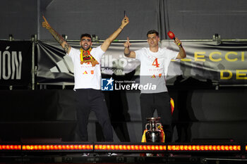 2024-07-15 - Spanish players Alvaro Morata (R) and David Raya (L) seen celebrating with the fans during the celebration of the Spanish national football team for the victory of the UEFA Euro 2024 title at Plaza de Cibeles on May 12, 2024 in Madrid, Spain. - SPAIN CELEBRATION UEFA EURO 2024 WIN - UEFA EUROPEAN - SOCCER