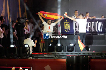 2024-07-15 - Spanish players Nacho Fernandez (L) and Alvaro Morata (R) seen celebrating during the celebration of the Spanish national football team for the victory of the UEFA Euro 2024 title at Plaza de Cibeles on May 12, 2024 in Madrid, Spain. - SPAIN CELEBRATION UEFA EURO 2024 WIN - UEFA EUROPEAN - SOCCER