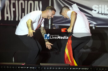 2024-07-15 - Spanish players Jose Luis Sanmartin Mato (Joselu) (L) and Alvaro Morata (R) seen celebrating during the celebration of the Spanish national football team for the victory of the UEFA Euro 2024 title at Plaza de Cibeles on May 12, 2024 in Madrid, Spain. - SPAIN CELEBRATION UEFA EURO 2024 WIN - UEFA EUROPEAN - SOCCER